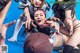 A group of young women playing a game of football.